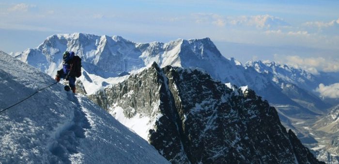 Climber on ascent of Mount Everest