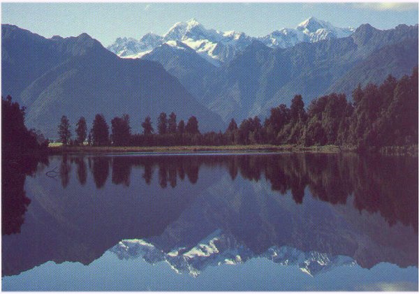 Mount Tasman and Mount Cook from Matheson Lake near Fox Glacier Town on the South Island of New Zealand