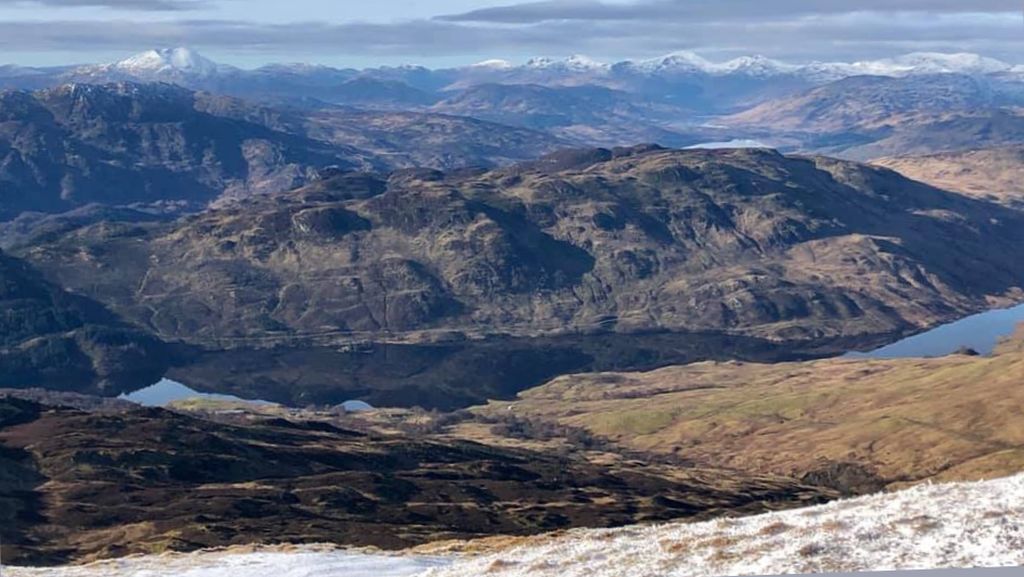 Ben Lomond and Arrochar Alps beyond Glen Kinglas Reservoir from Ben Ledi