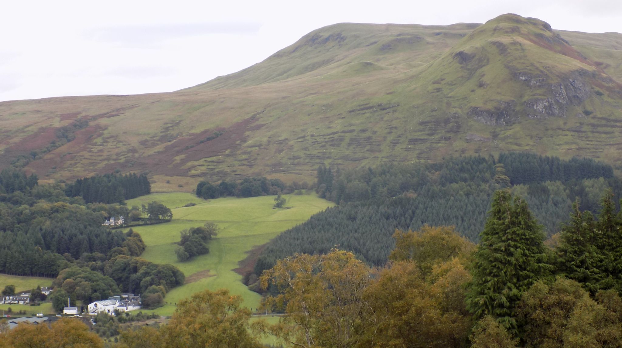 Dungoyne Distillery beneath the Campsie Fells from Quinloch Muir